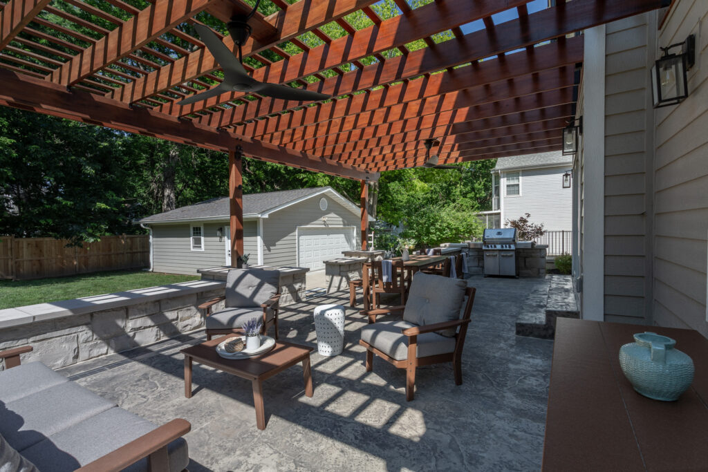 wide shot from under the pergola out into the hard